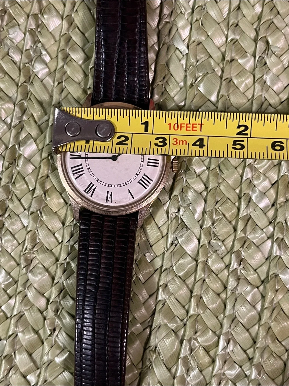 Piaget Silver Case Watch with Black Leather Strap and White Dial